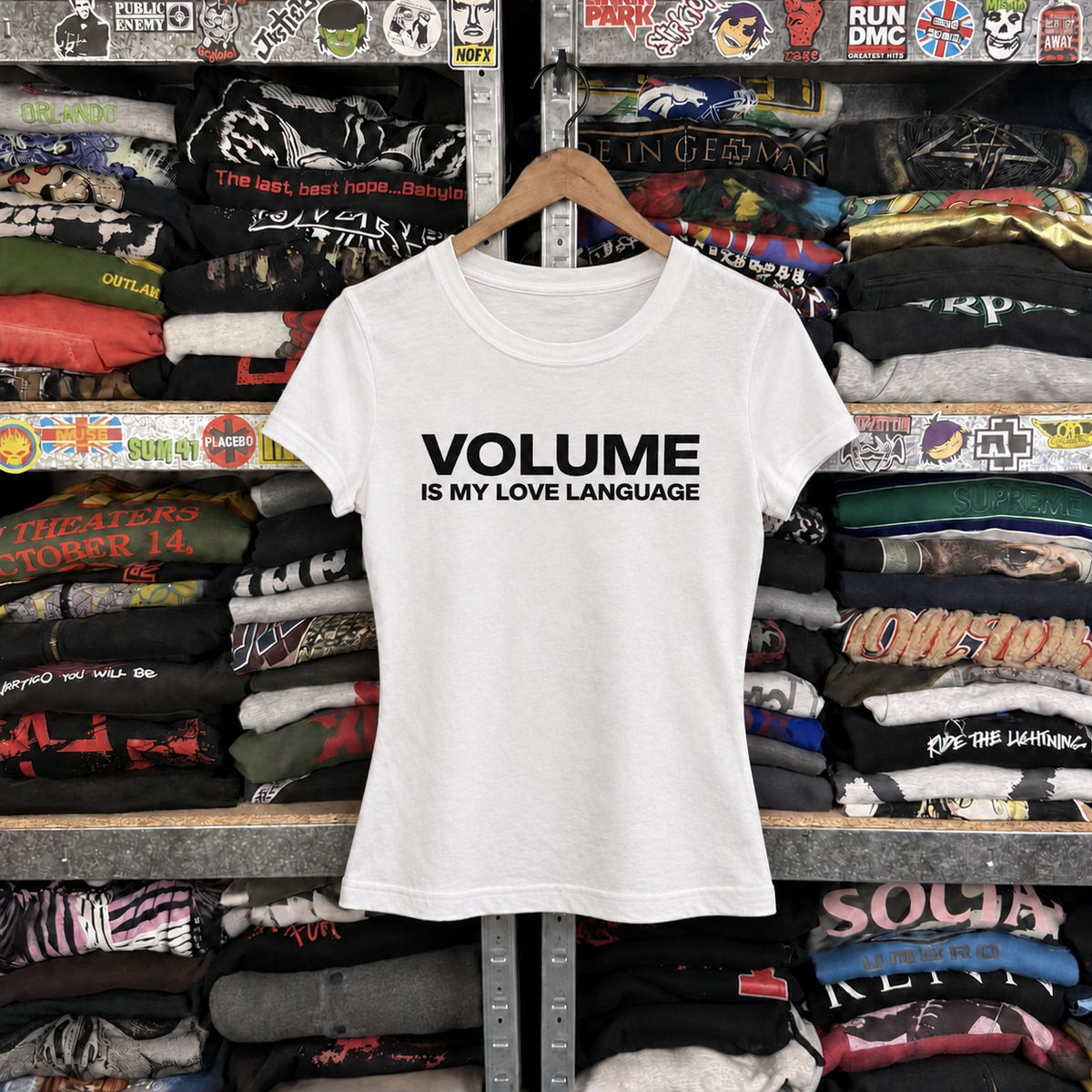 Y2K Volume Is My Love Language Women's Statement Tee — off-body front on wooden hanger