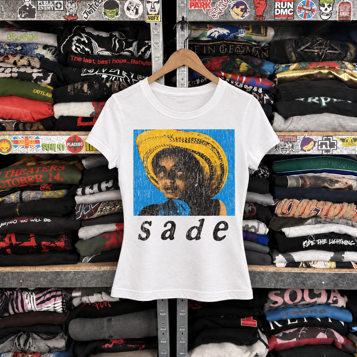 Sade Womens White Tee — off-body front on wooden hanger