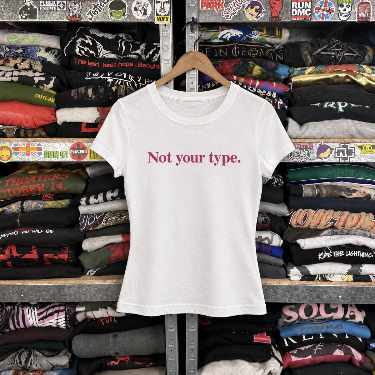 Y2K Not Your Type Womens Statement Tee — off-body front on wooden hanger